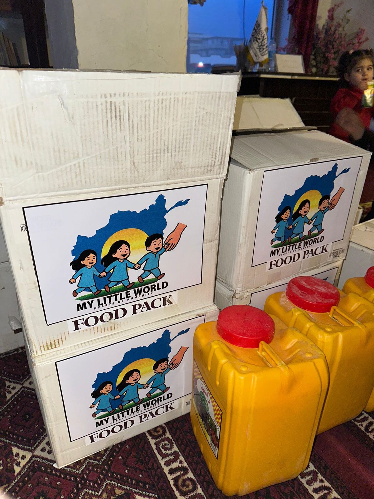 Food Pack boxes and cooking oil ready for distribution